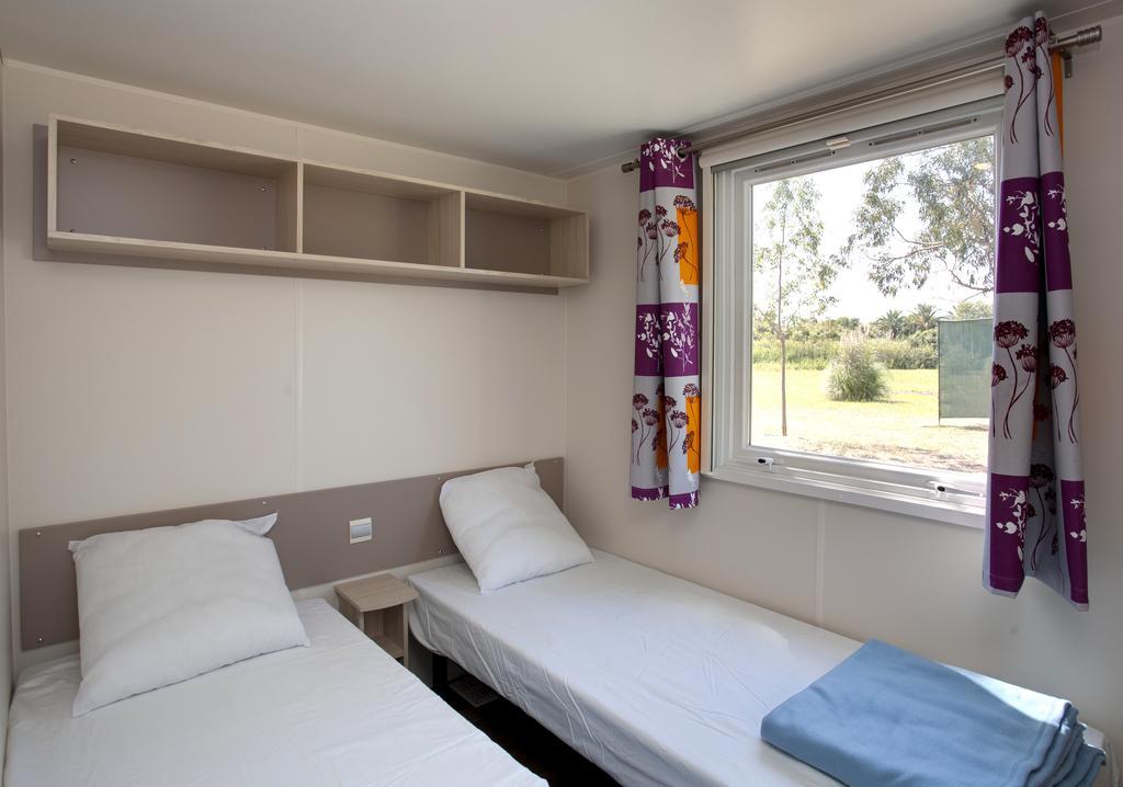 Готель Camping Miami Plage Poggio Mezzana Номер фото